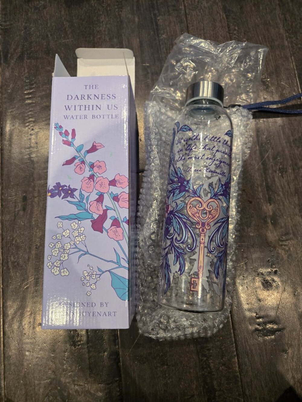 FairyLoot The Darkness Within Us Water Bottle | Purple/Floral